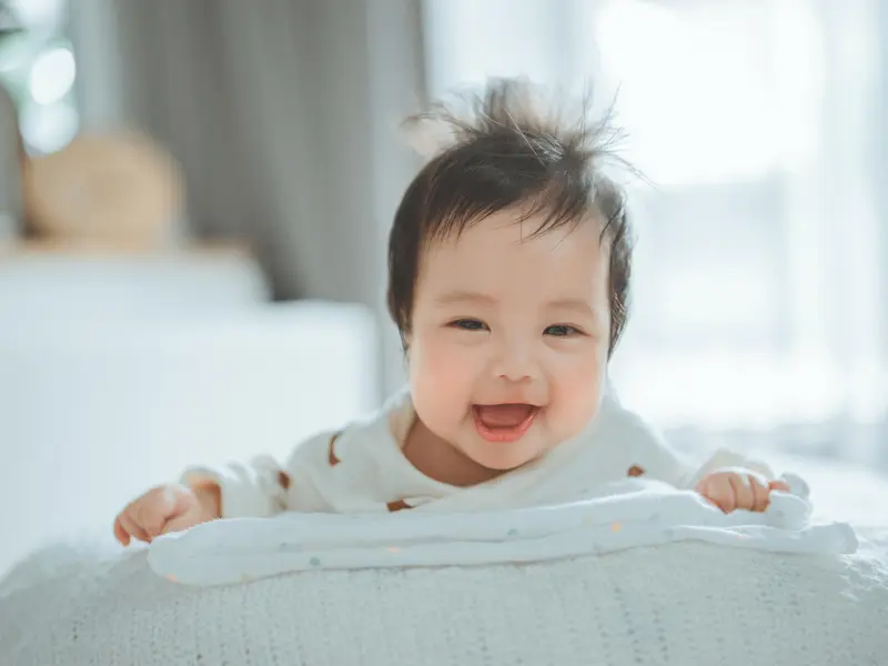 premier sourire de bébé